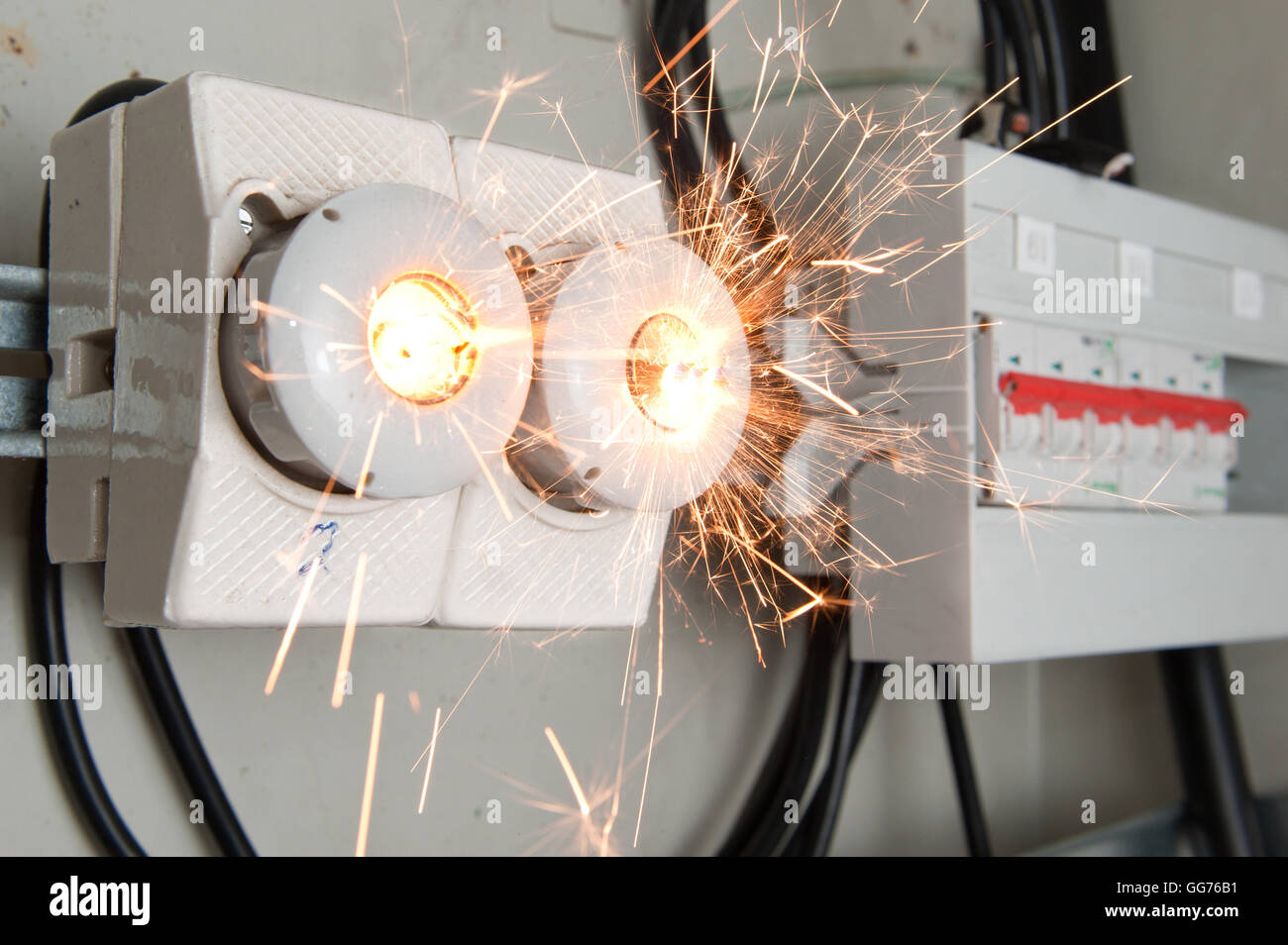 Overloaded electrical circuit causing fuse to break Stock Photo