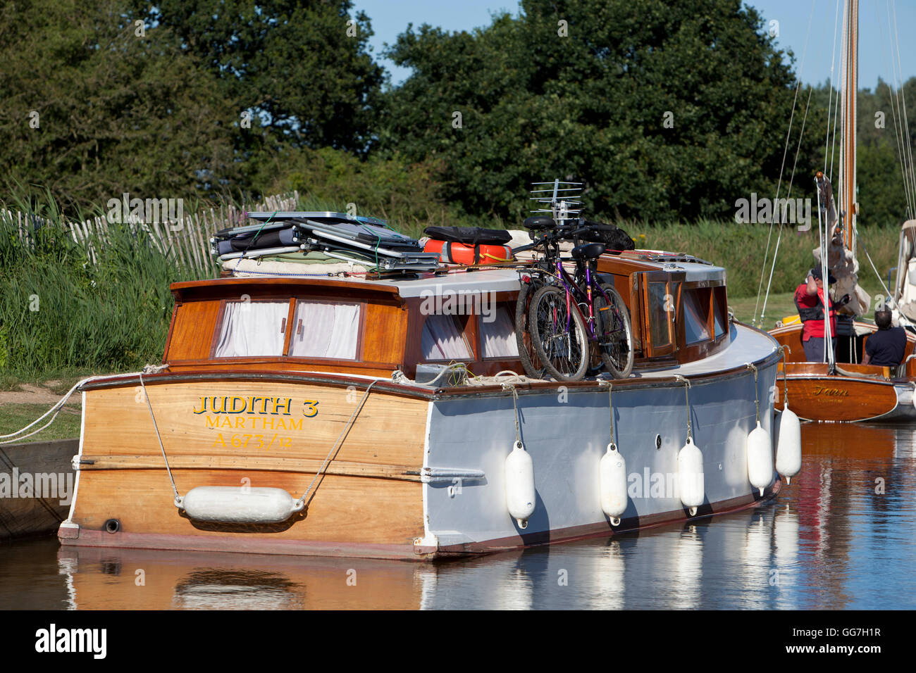Broads cruiser moored at Horsey Staithe on the Norfolk Broads Stock Photo
