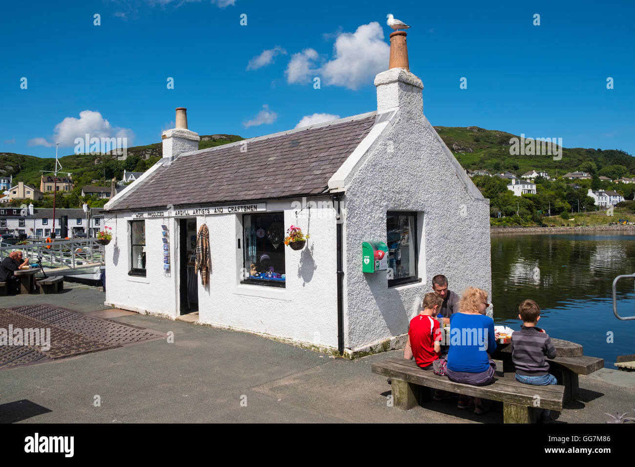 Shop on harbour side at  Tarbert on Kintyre peninsula in Argyll and Bute in Scotland, United Kingdom Stock Photo