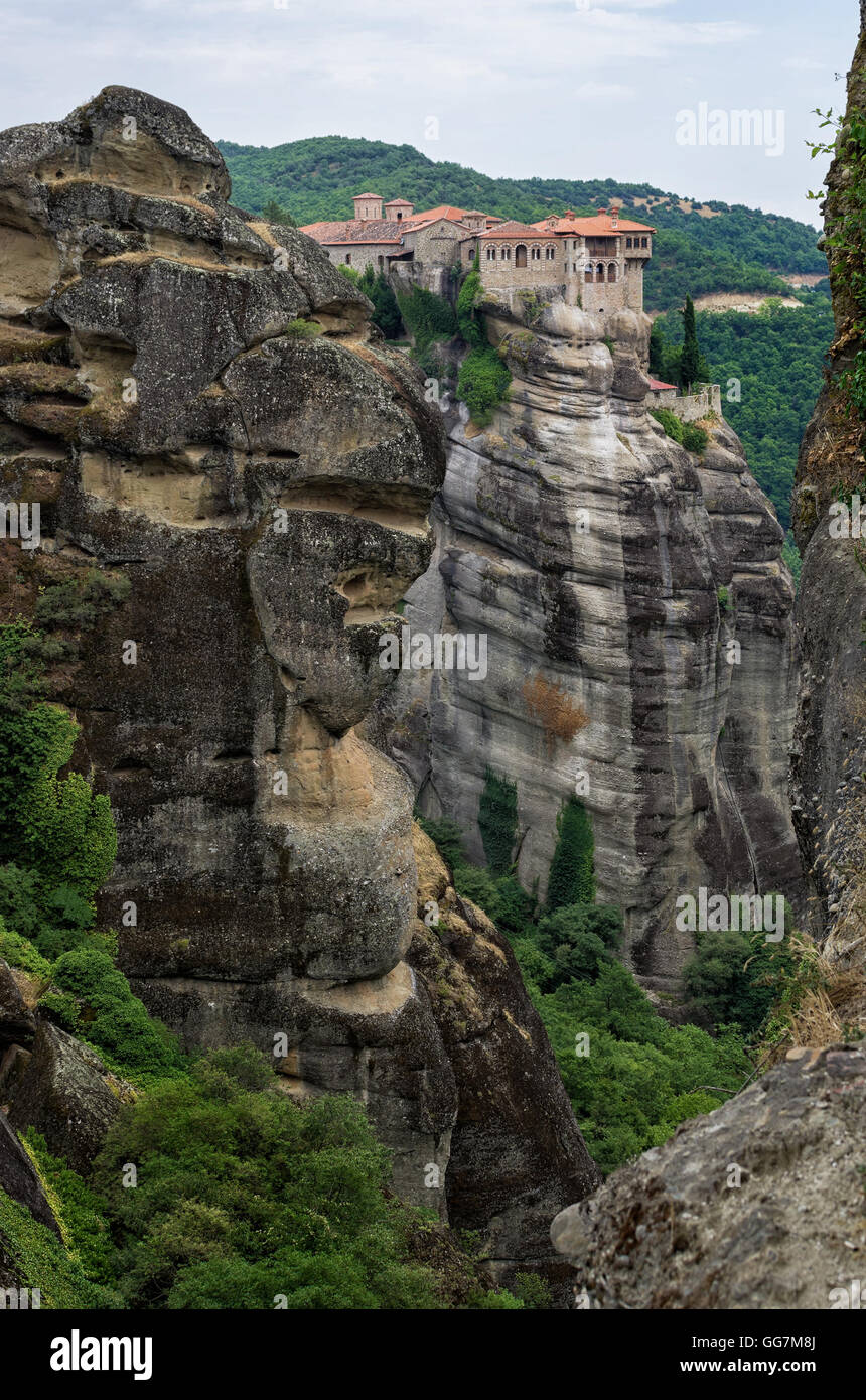 Amazing scenery with a monastery on top of a huge rock in Meteora ...