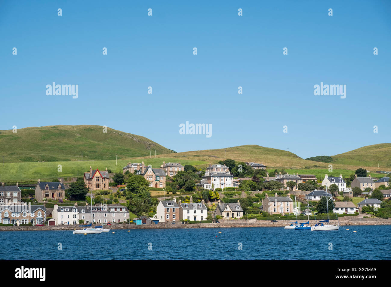 View of houses beside harbour at Campbeltown on Kintyre Peninsula in Argyll and Bute in Scotland United Kingdom Stock Photo