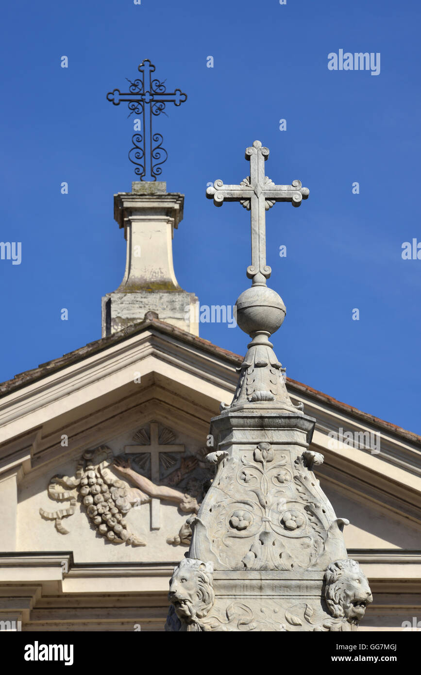 Holy crosses at the top of monuments in Tiber Island (Rome) Stock Photo