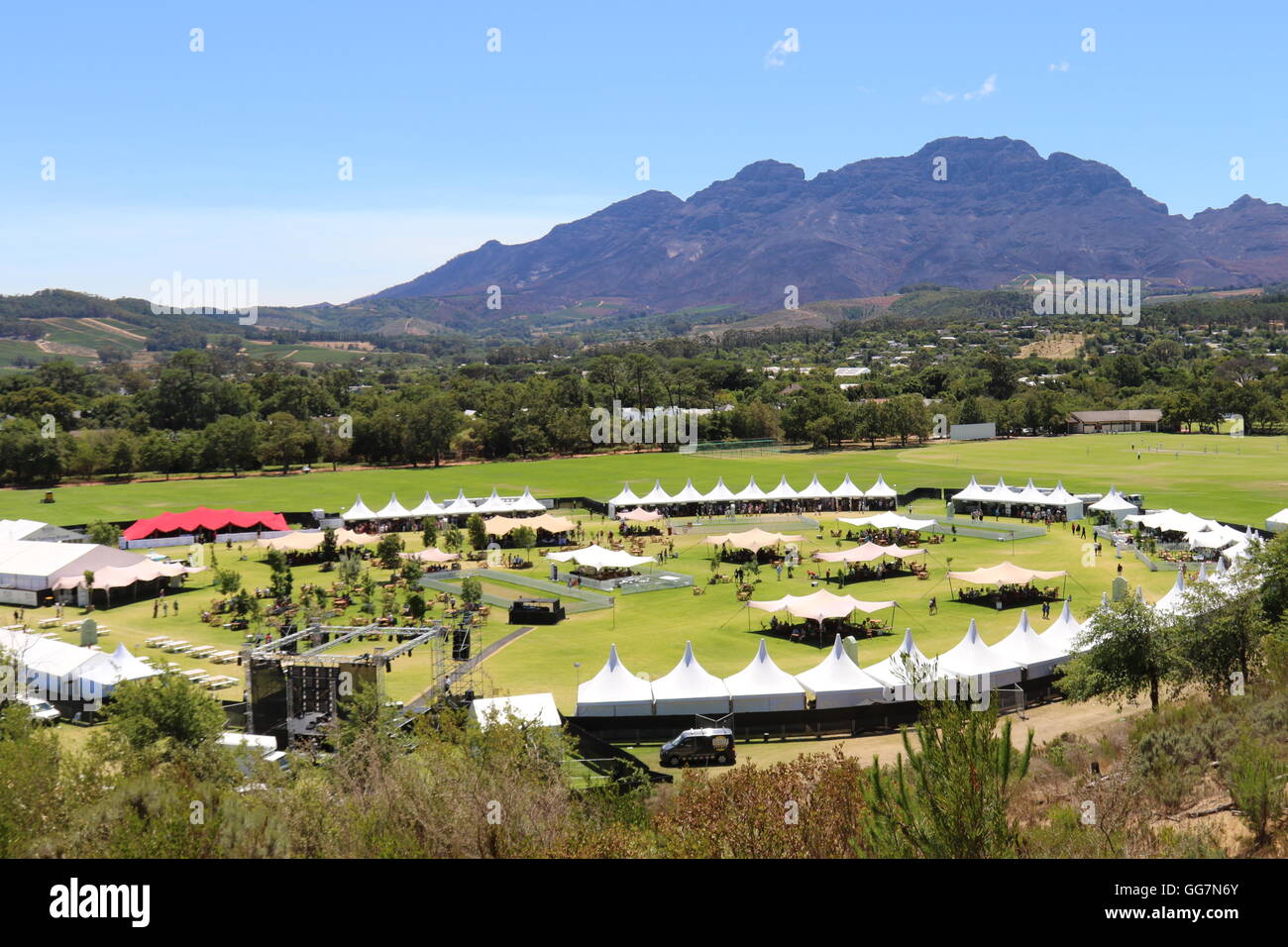 view onto the festival ground at the 2016 Stellenbosch Wine Festival with the mountains in the background Stock Photo