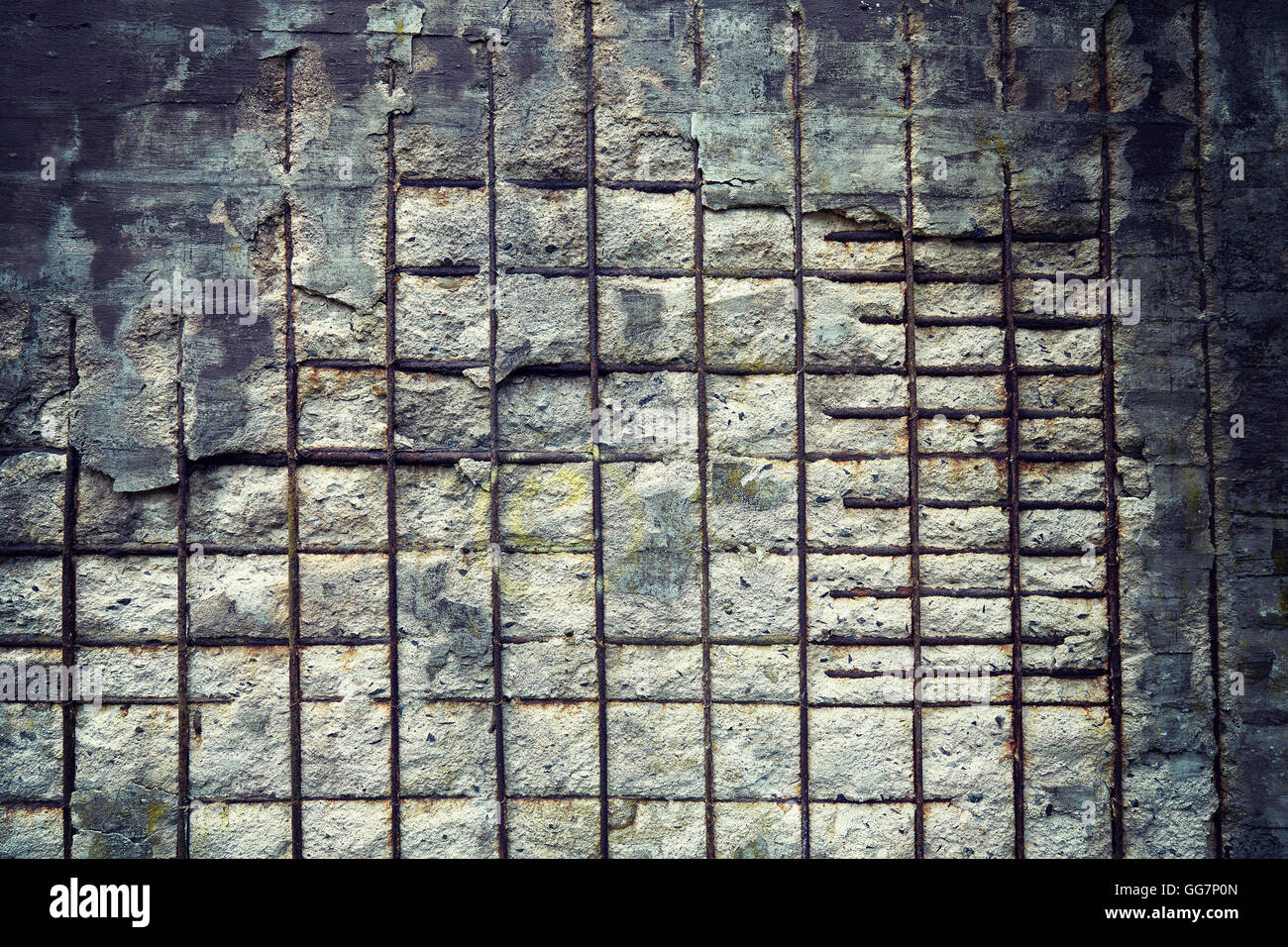 Vintage toned background made of reinforced concrete wall. Stock Photo