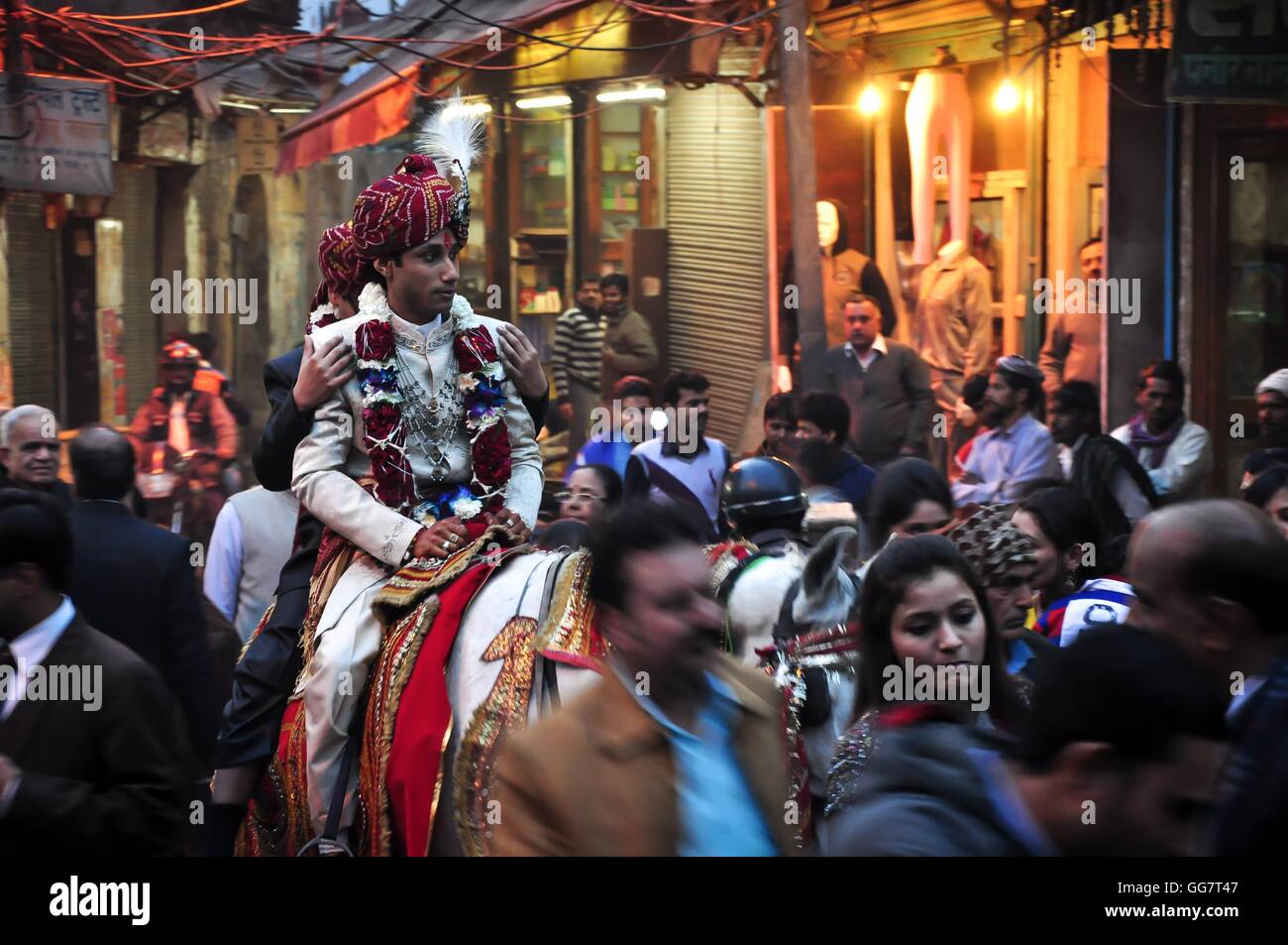 Groom On A White Horse As Part Of An Indian Wedding Procession