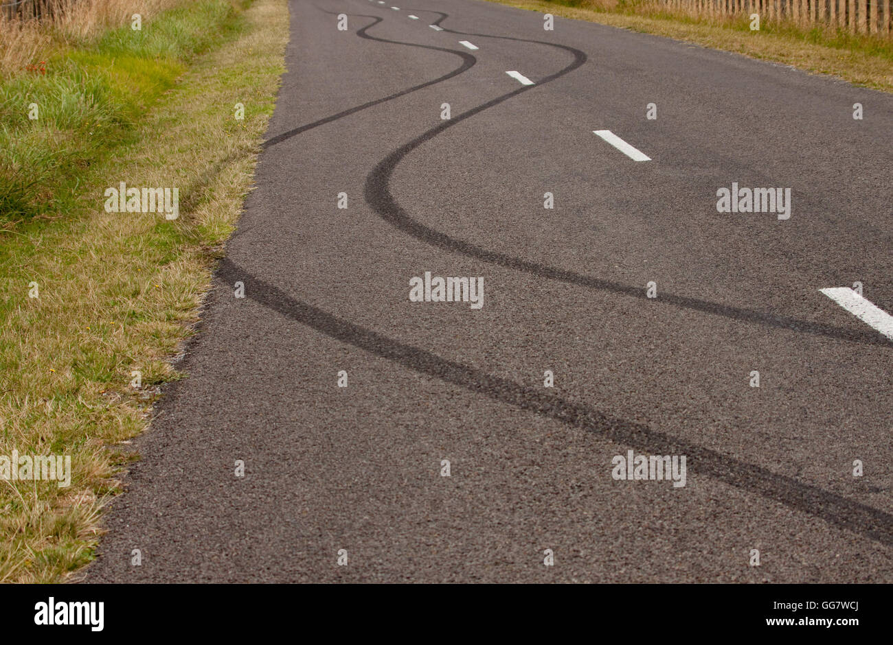tyre skid marks on road Stock Photo