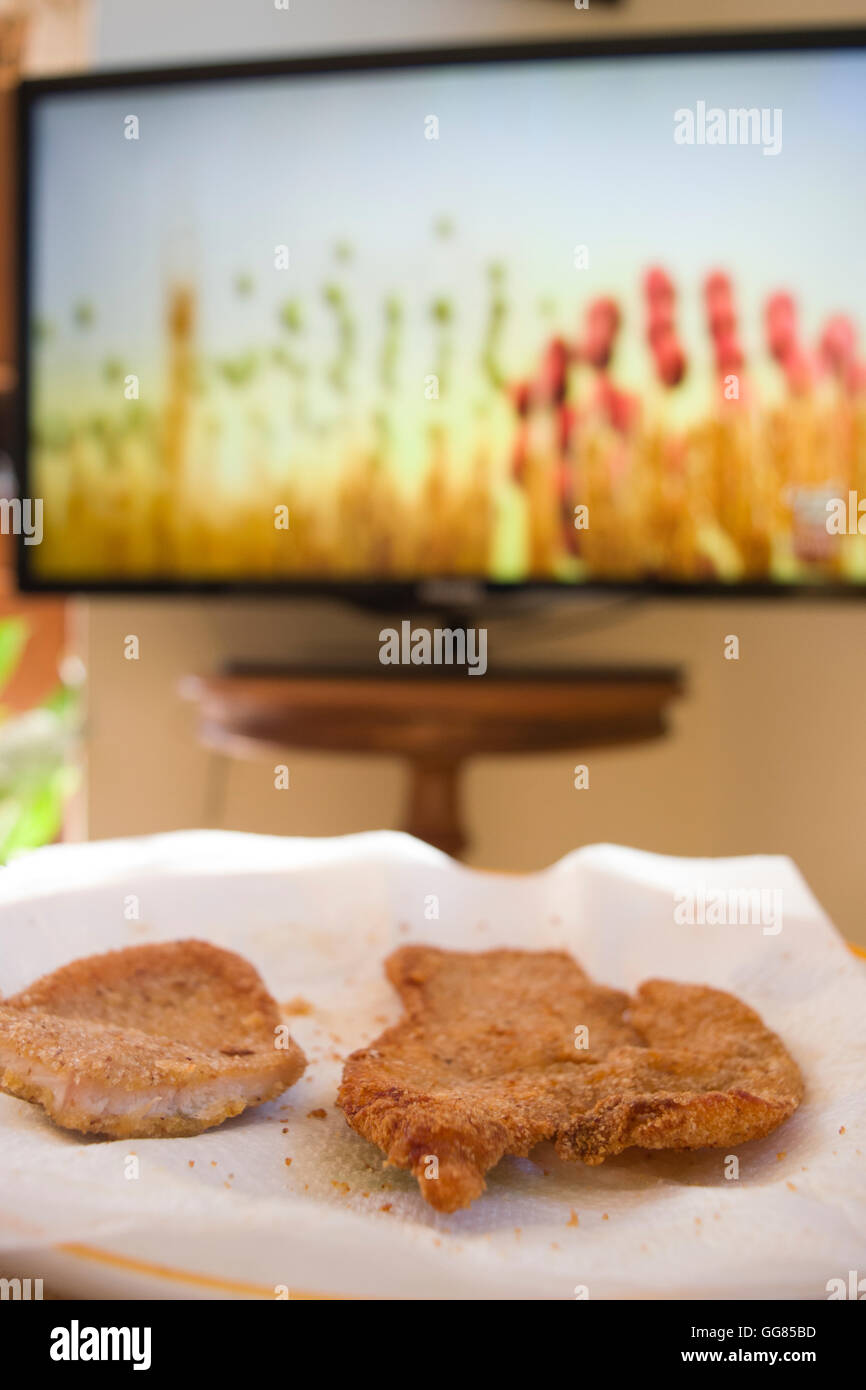 veal cutlet dipped in egg, breaded and fried in butter called alla