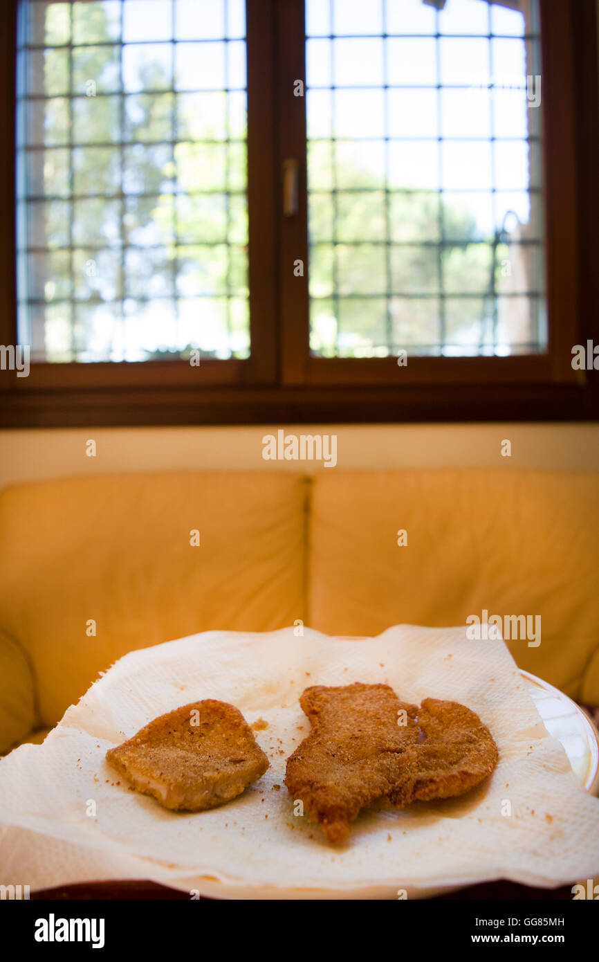 veal cutlet dipped in egg, breaded and fried in butter called alla