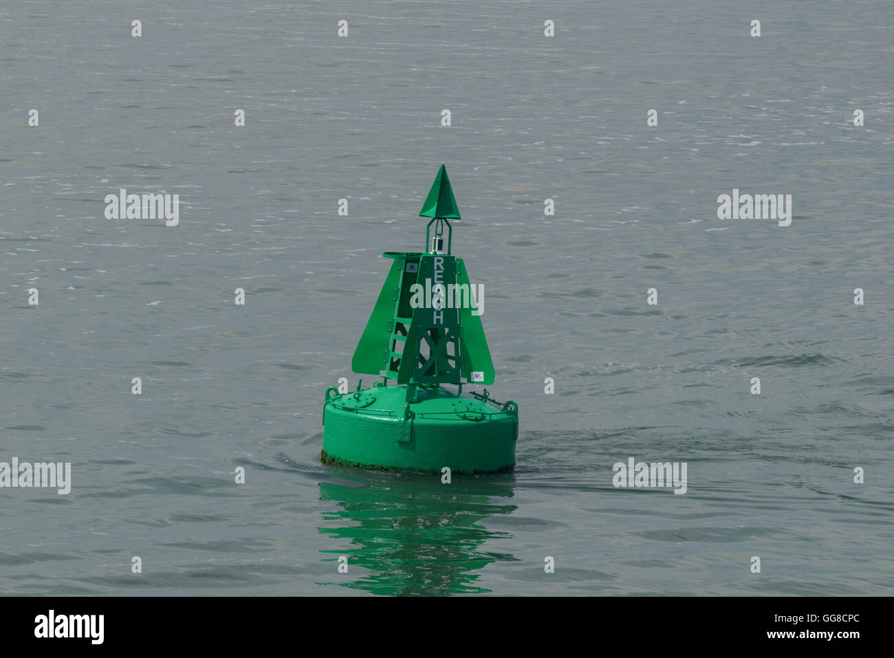 A green marker buoy in the Solent Stock Photo Alamy