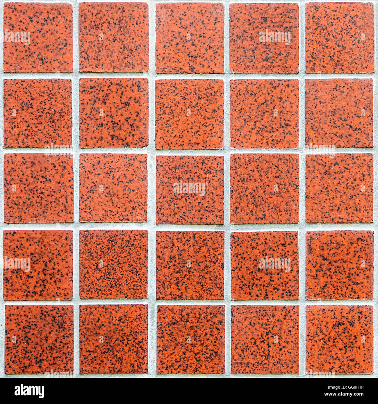 mosaic made of modern red ceramic tiles with squares and white border