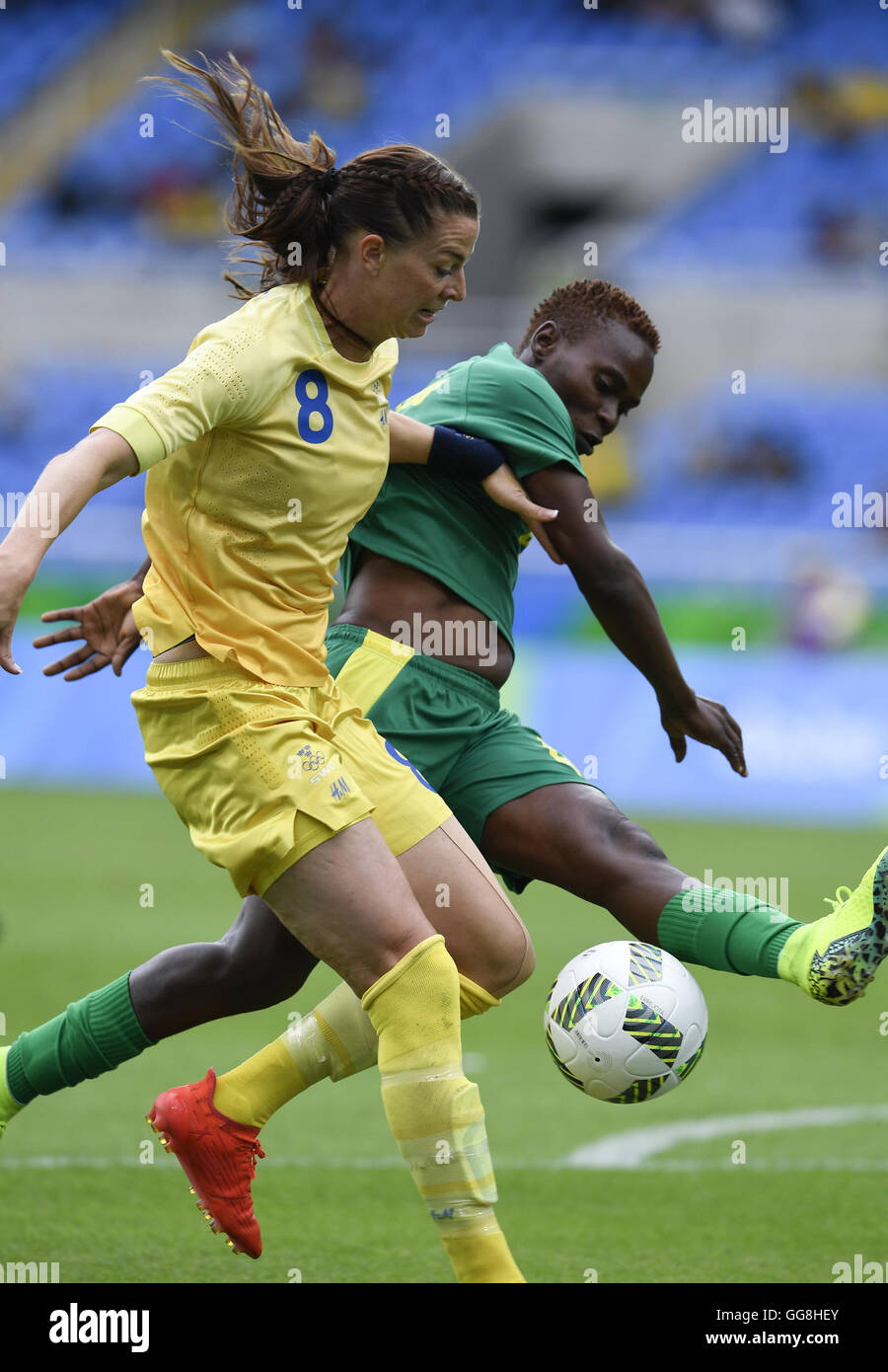 Rio De Janeiro, Brazil. 3rd Aug, 2016. Schelin Lotta of Sweden (L) competes during the opening match of the women's Olympic football competitions between South Africa and Sweden at the Olympic Stadium in Rio de Janeiro, Brazil, Aug. 3, 2016. Sweden won 1-0. © Qi Heng/Xinhua/Alamy Live News Stock Photo
