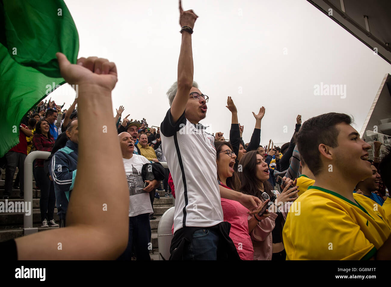Sao Paulo, Brazil. 3 August 2016. Women's Soccer: Crowd celebrating Canada's women's soccer teams first goal that came just 19 seconds into the game at the Corinthians Arena the Rio 2016 Olympic Games in Sao Paulo, Brazil. Credit:  Samy St Clair /Alamy Live News Stock Photo