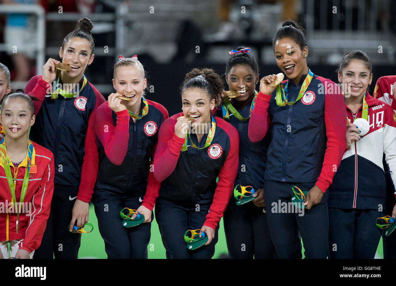 Rio De Janeiro Rj Brazil 9th Aug 16 Team Usa Gymnasts Alexandra Raisman Madison Kocian Lauren Hernandez Simone Biles And Gabrielle Douglas Bite Their Gold Medals In Women S Team Finals At Rio Rio De Janeiro Rj Brazil 9th Aug 16 Team Usa Gymnasts Alexandra Raisman Madison Kocian Lauren Hernandez Simone Biles And Gabrielle Douglas Bite Their Gold Medals In Women S Team Finals At Rio