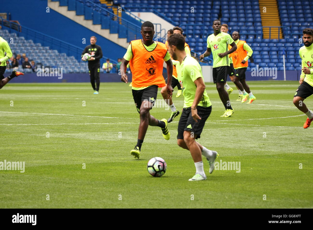 Chelsea Football team train at Stamford Bridge under the watchful eye ...
