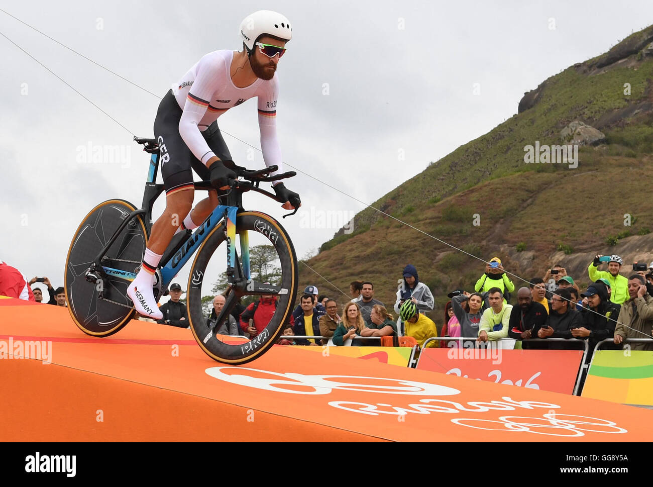 Rio de Janeiro, Brazil. 10th Aug, 2016. Simon Geschke of Germany at the start of the men's Individual Time Trial of the Rio 2016 Olympic Games Road Cycling events at Pontal in Rio de Janeiro, Brazil, 10 August 2016. Photo: Sebastian Kahnert/dpa/Alamy Live News Stock Photo