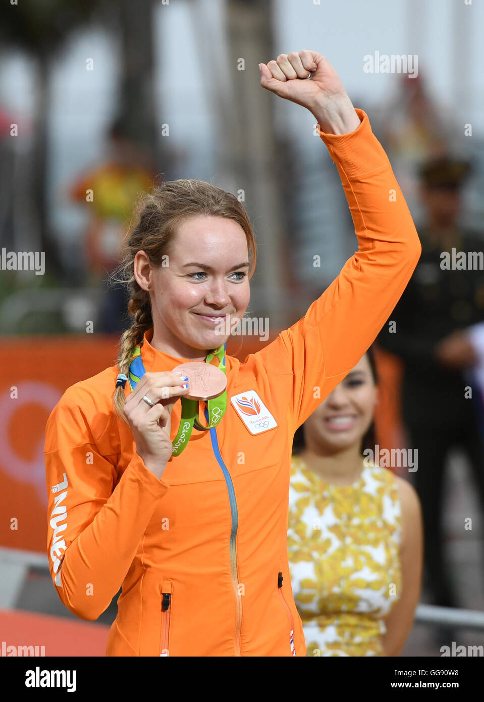 Rio de Janeiro, Brazil. 10th Aug, 2016. Third placed Anna van der Breggen of the Netherlands celebrates on the podium after the women's Individual Time Trial of the Rio 2016 Olympic Games Road Cycling events at Pontal in Rio de Janeiro, Brazil, 10 August 2016. Photo: Soeren Stache/dpa/Alamy Live News Stock Photo