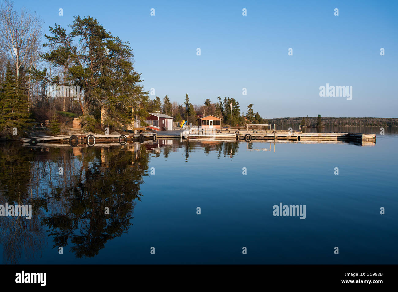 Scenic view of fishermen houses along shore of a lake in Kenora, Ontario,Canada Stock Photo