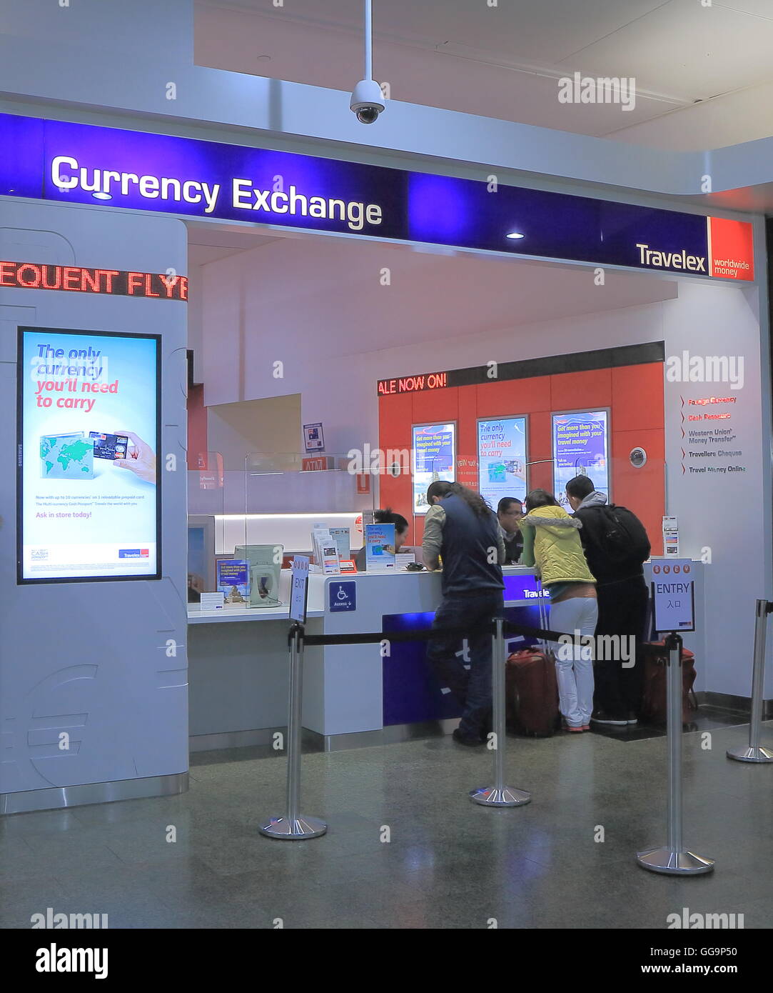 People exchange money at Travelex Melbourne Airportin Melbourne Australia. Stock Photo