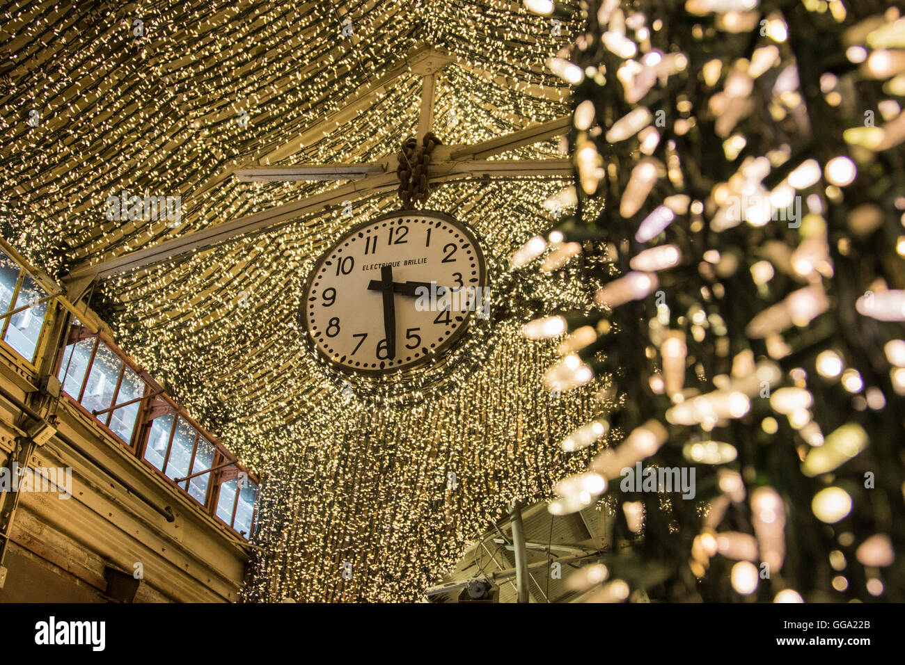Clock and Lights in Chelsea Market, New York City Stock Photo