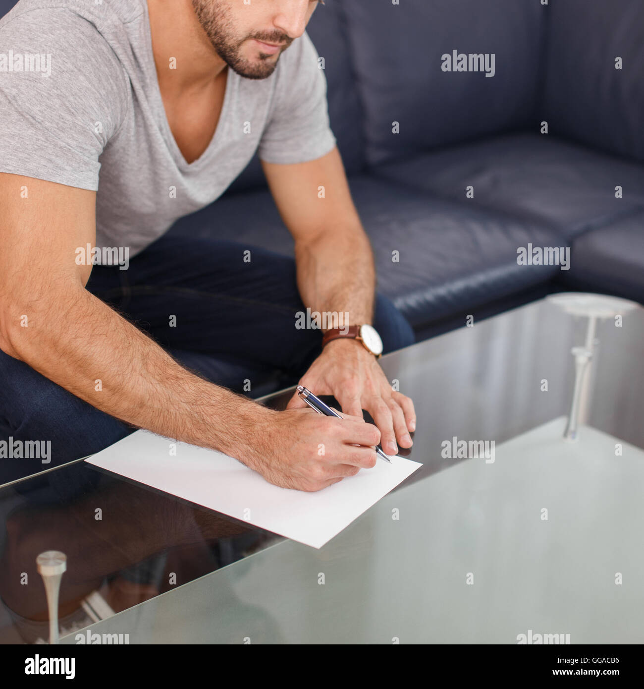 Casual white man start writing on blank paper in office stock photo alamy