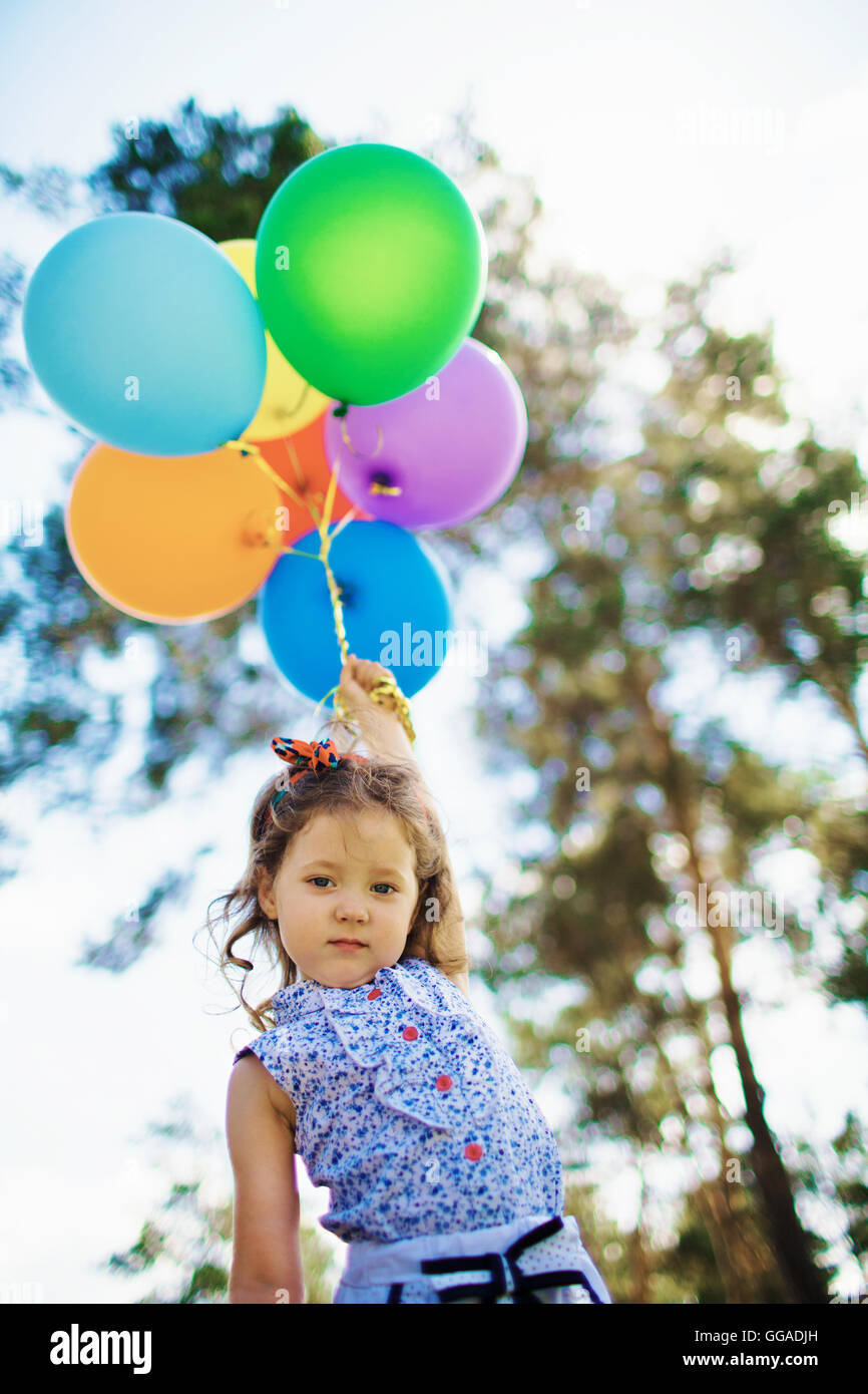 Girl with balloons Stock Photo Alamy
