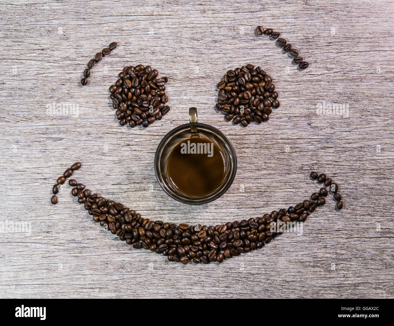 A smiley face from many coffee beans Stock Photo Alamy