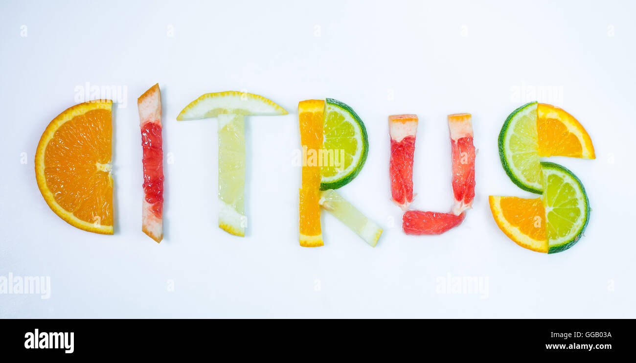 CITRUS word composed of different citruses on white background Stock