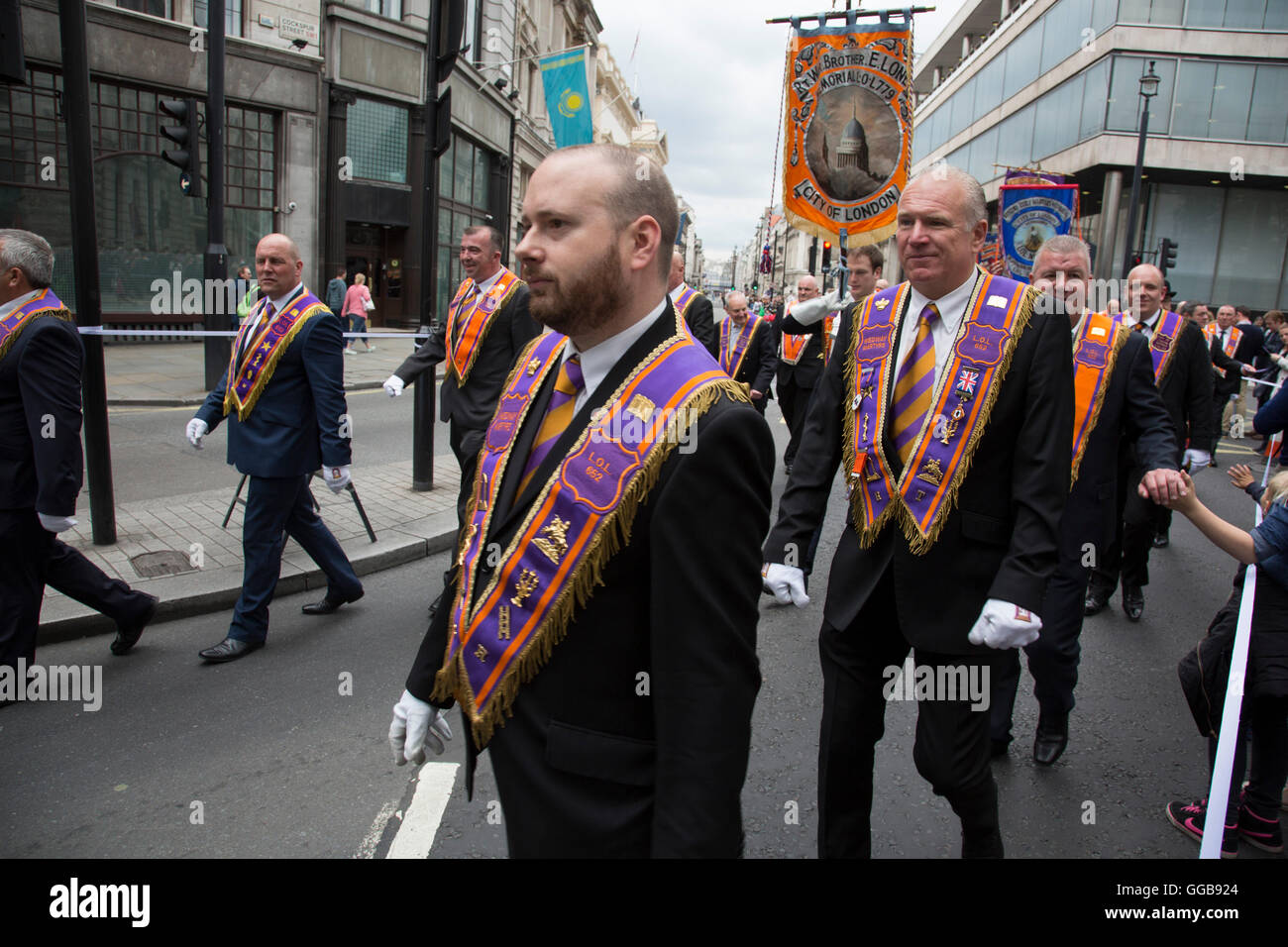 Orangemen from the Grand Orange Lodge of England, Parade to mark H.M. The Queen’s 90th Birthday on June 16th 2016 in London, United Kingdom. The Loyal Orange Institution, more commonly known as the Orange Order, is a Protestant fraternal organisation based primarily in Northern Ireland. Stock Photo