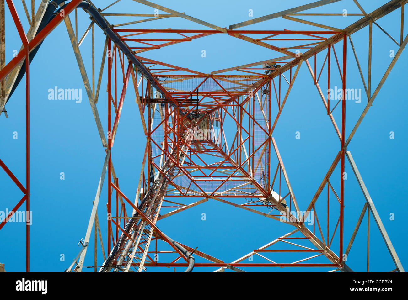 Giant antenna's pylon in front of Monastery at the top of Mount