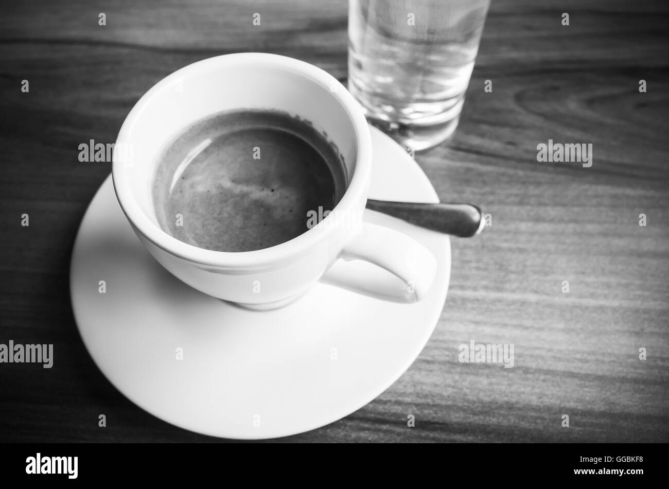 Cup of espresso coffee, black and white photo with selective focus Stock Photo
