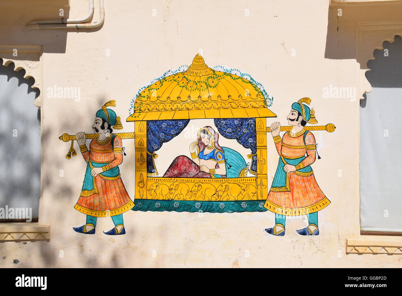Traditional indian wall paintings on the walls of City palace in Udaipur, Rajasthan, India Stock Photo