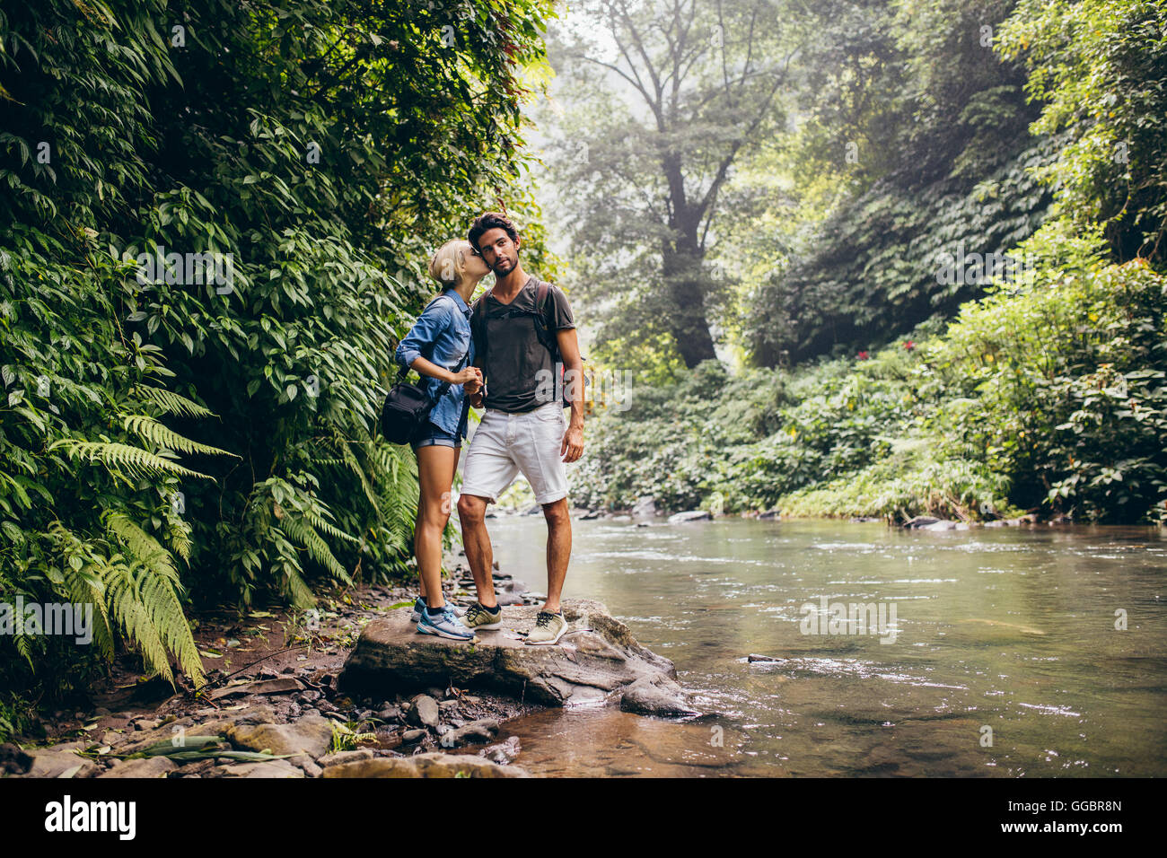 Couple kissing on mountain hi-res stock photography and images - Alamy