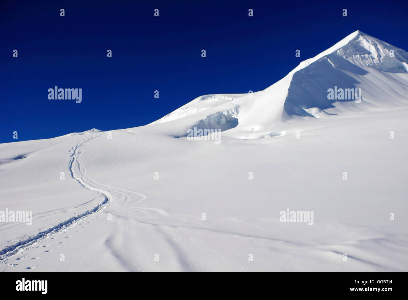 Climbers tracks in snow on route  Mera Peak Stock Photo