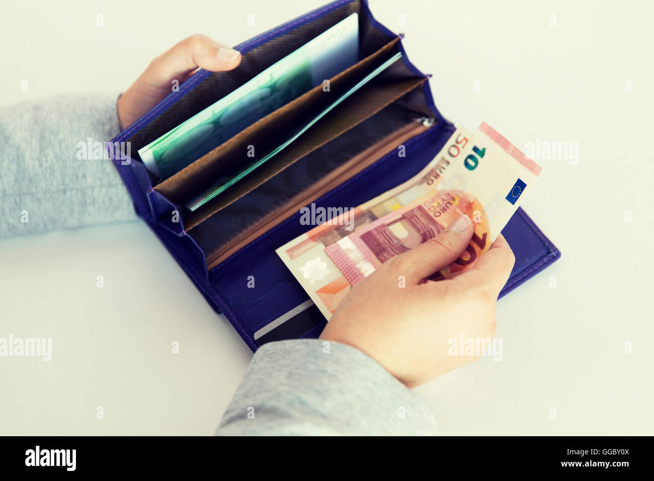 close up of woman hands with wallet and euro money Stock Photo - Alamy