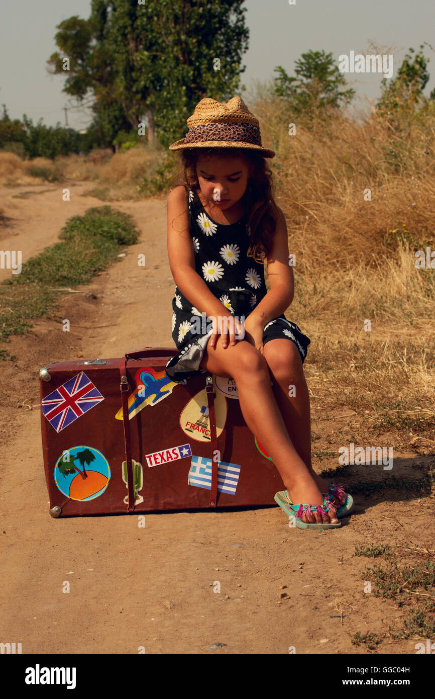 Girl with suitcase Stock Photo Alamy