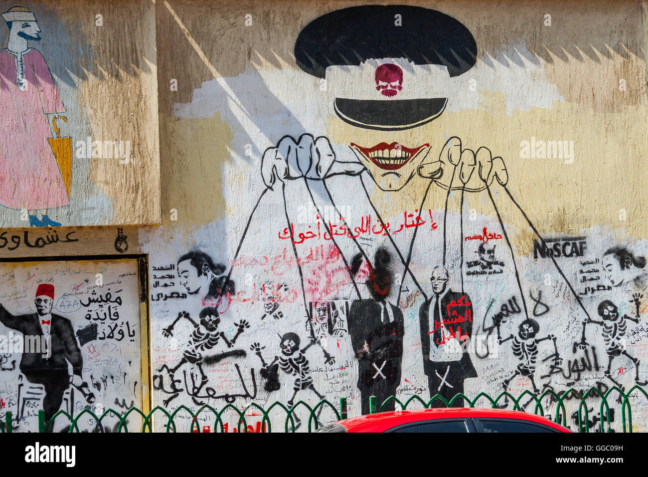 Egypt, Cairo, graffiti of the Egyptian revolution on Mohamed Mahmoud Street. The puppetmaster. Stock Photo