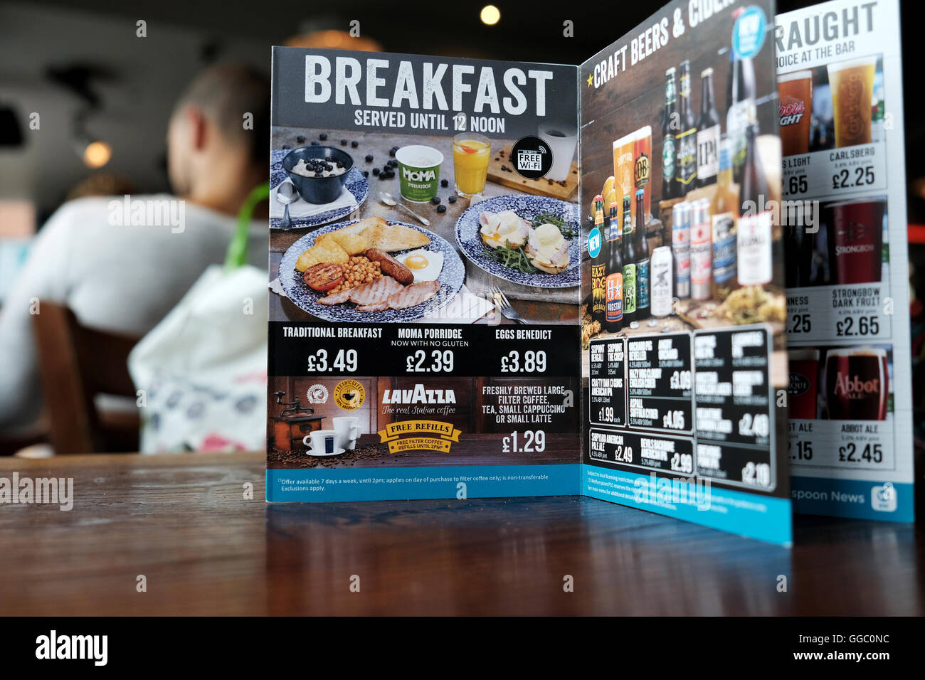 A menu card from a JD Wetherspoons pub in Central Birmingham. The card shows the prices of the breakfast options available in the pubs until midday Stock Photo