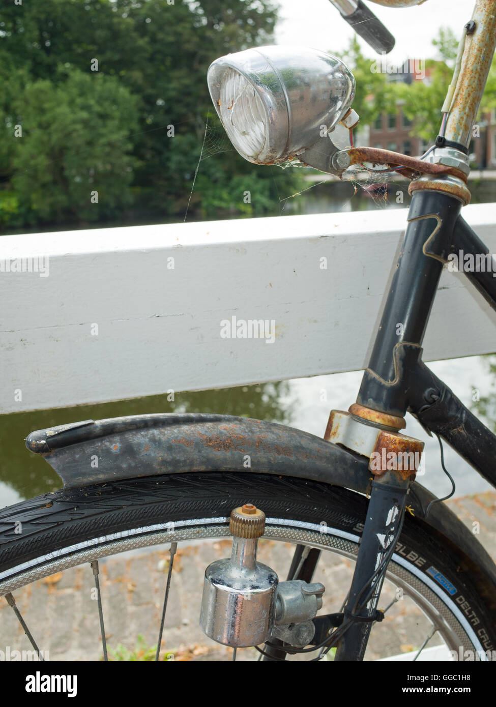 Dynamo powered front bicycle lamp Stock Photo