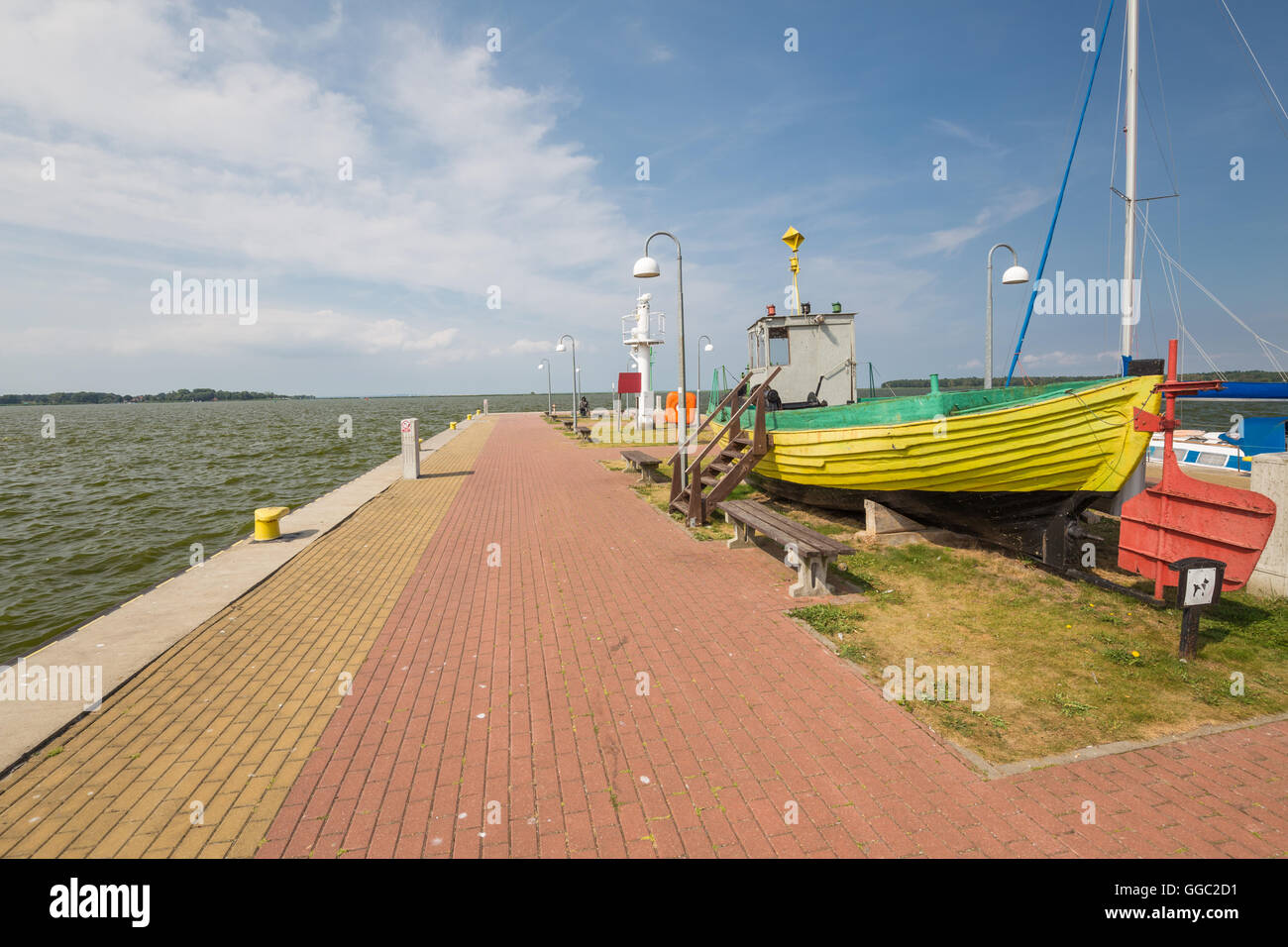 View of the scenic harbor in Nowe Warpno village, Poland, Western Pomerania / keelboat Stock Photo