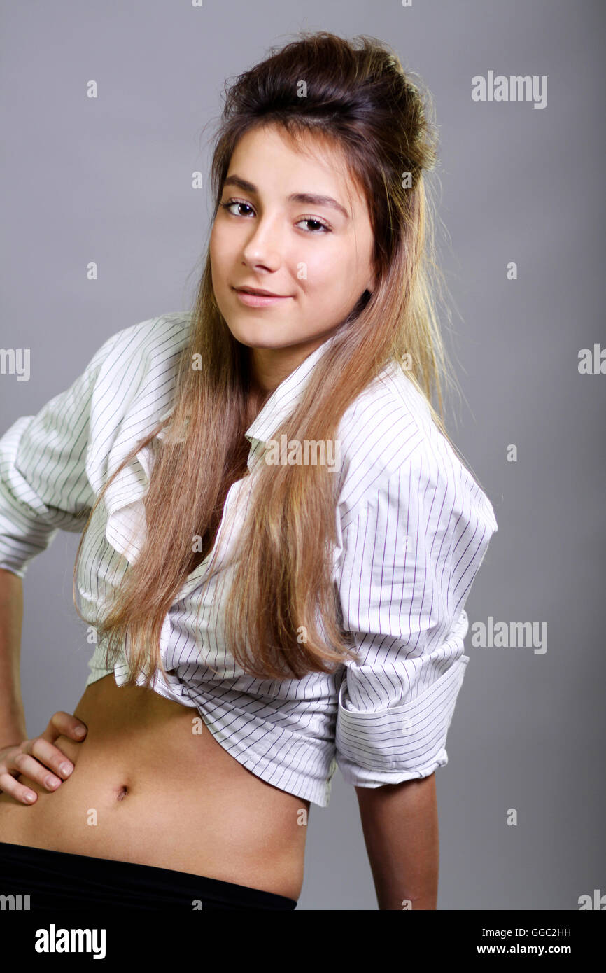 Portrait of beautiful woman in white shirt Stock Photo - Alamy