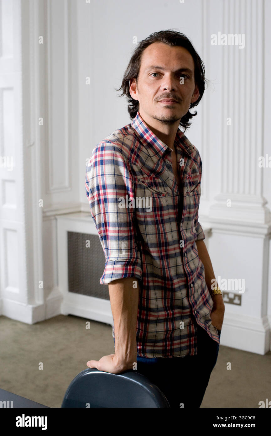 Brit fashion designer Matthew Williamson pictured in his London office in Mayfair. MW normally shows at New York Fashion Week, but will join Burberry at London Fashion Week in September to help celebrate the events 25th birthday Stock Photo