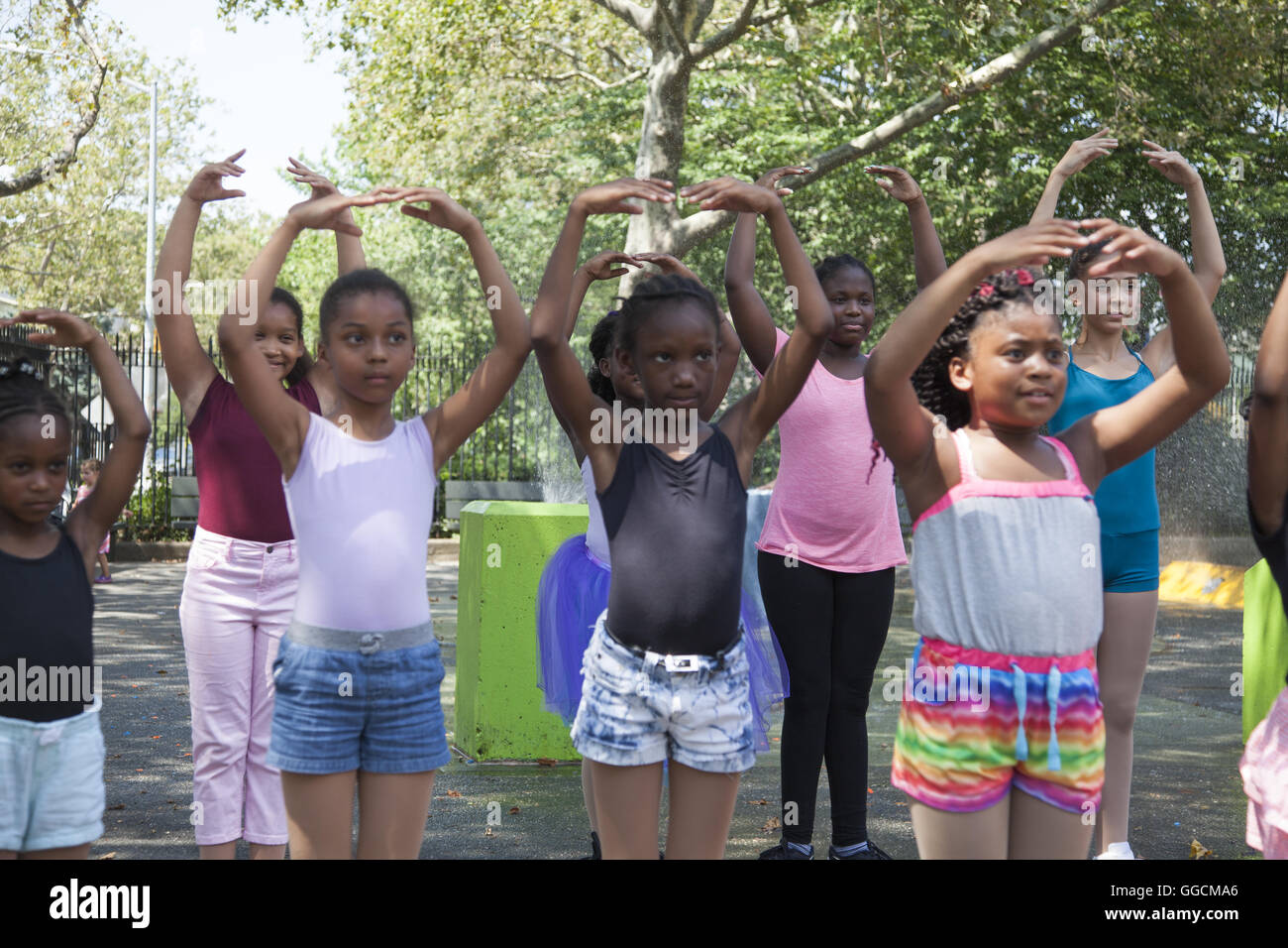 Young dancers from Cynthia King Dance perform at a local neighborhood playground in Brooklyn, New York. Stock Photo
