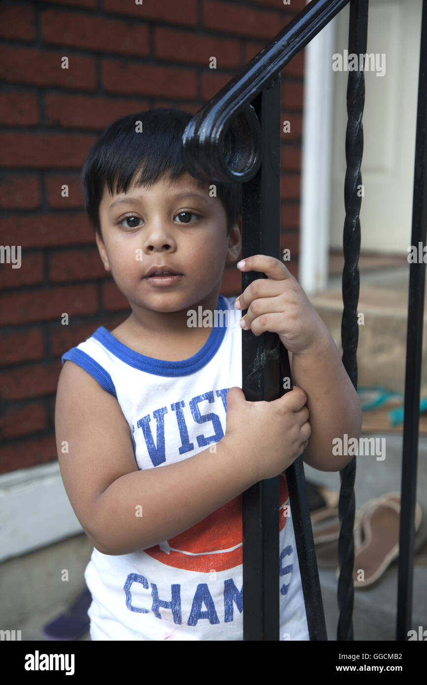 3 year old Bangladeshi American boy on his third birthday in Brooklyn, NY Stock Photo