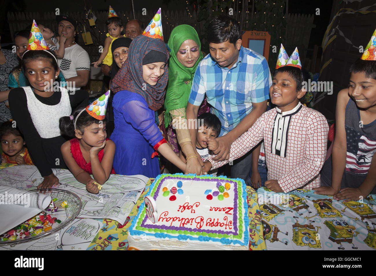 Family birthday party muslim hi-res stock photography and images - Alamy