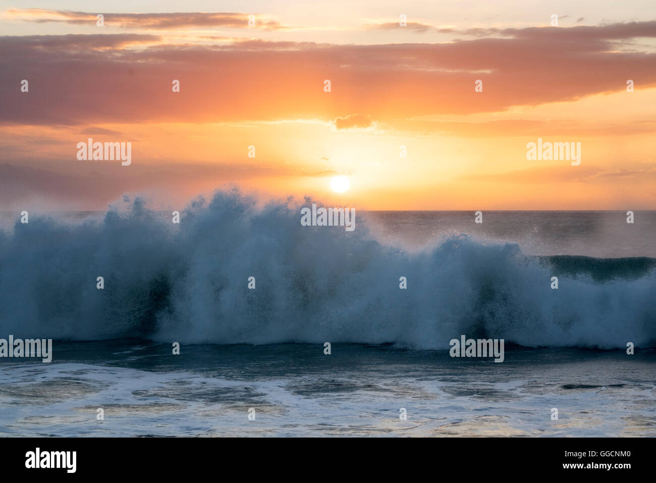 Sunset and waves at Hapuna Beach. Hawaii Island Stock Photo