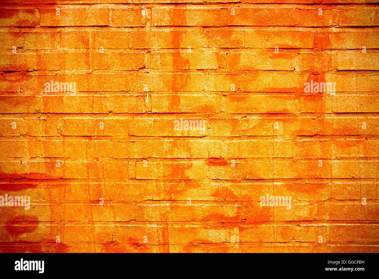 brick wall in orange colors as a background Stock Photo
