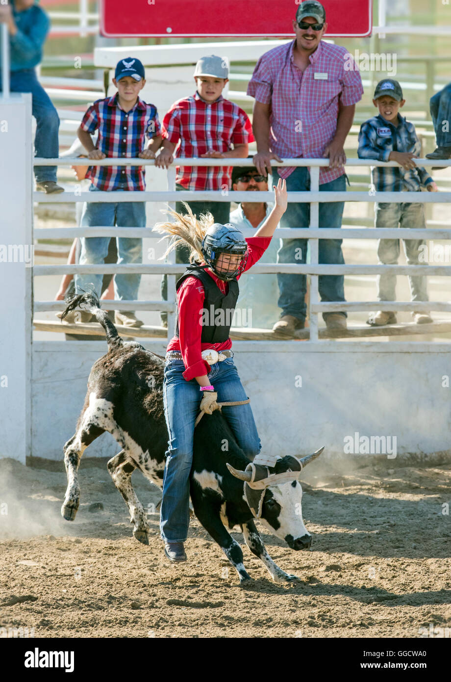 Young Cowgirl Horseback Riding In Stock Photos & Young Cowgirl ...