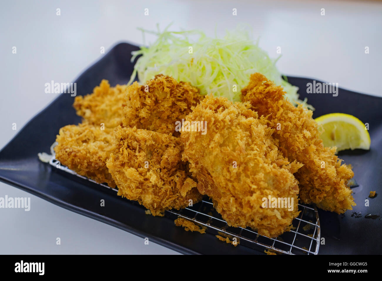 The famous japanese style food fry pork chop Stock Photo Alamy