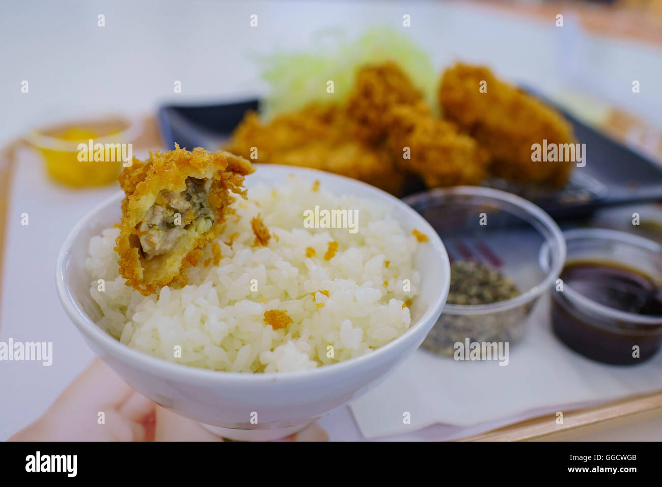 Eating the delicious japanese style food Fry Oyster Stock Photo Alamy