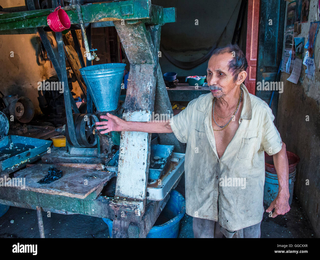Salvadoran man work at a Corn tortilla factory in Suchitoto El Salvador